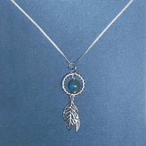 Silver Necklace With Bead And Charms